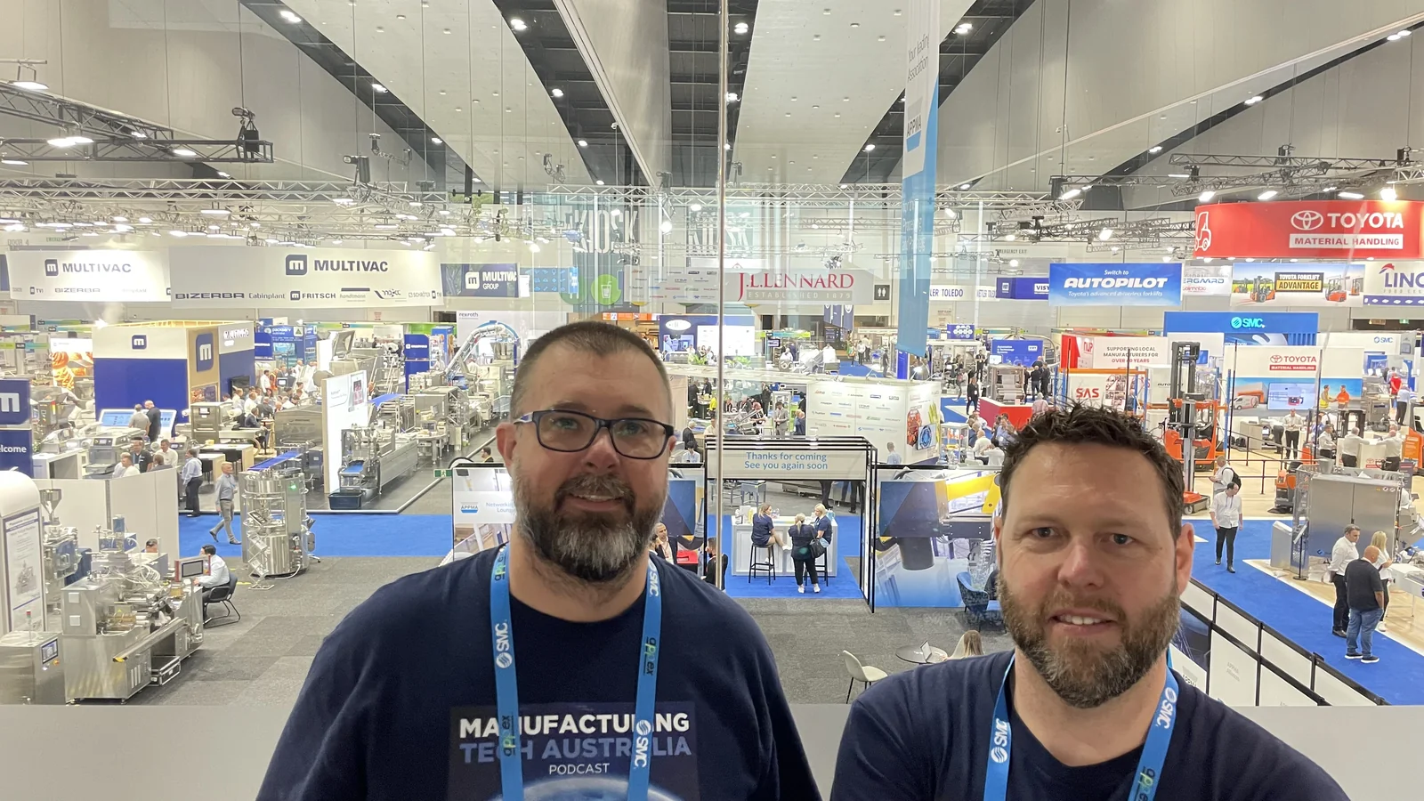 Shane Williams with Trimatt exhibitors on the APPEX 2024 show floor